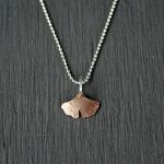 14k gf hammered gingko leaf pendant on 18 inch sterling chain. 
14k gf chain is available upon request.