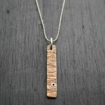 Brass Birch Pendant. On sterling silver chain with sterling silver accents. 