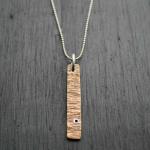 Brass Birch Pendant. On sterling silver chain with sterling silver accents. 
