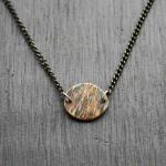 Brass Bark Oval Necklace. Textured thick-gauge brass treated with a heat patina. $45.00