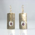 Hepworthy Totems. Subtle hammered texture; gold-filled with garnet.
$95.00