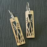 Hand cut  14k GF and sterling silver inspired by silhouettes of willowy sea oats.