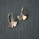 14k gf textured gingko leaves. Earwires are 14k gf.  1/2 inch wide and 3/8 of an inch long