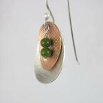 Jade Pod earring detail. Textured sterling silver and copper with jade beads.