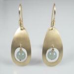 Hepworthy Teardrops. Clean, brushed finish; gold-filled with aquamarine beads. 
$105.00. 